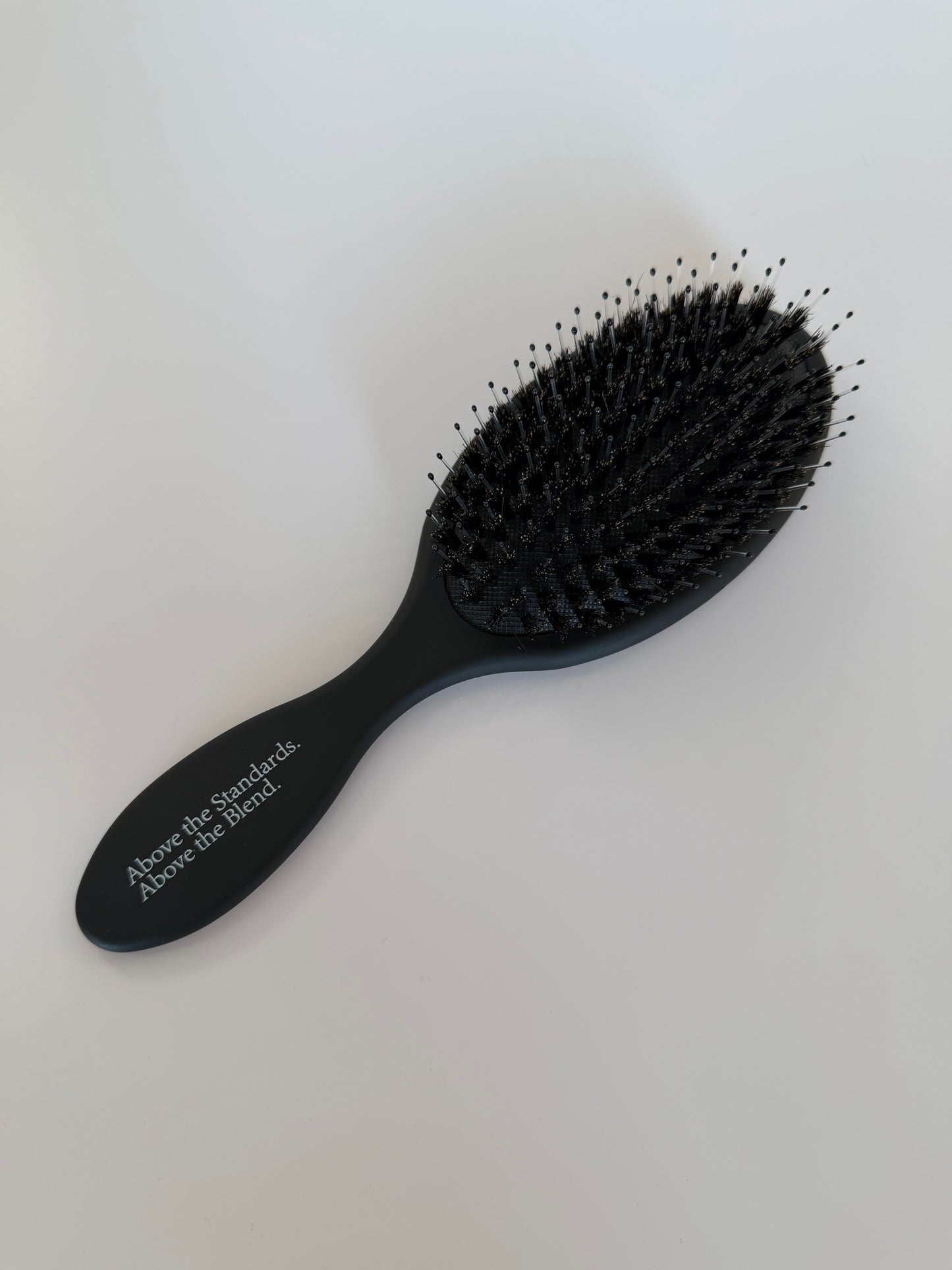 ABOVE HAIR BRUSH