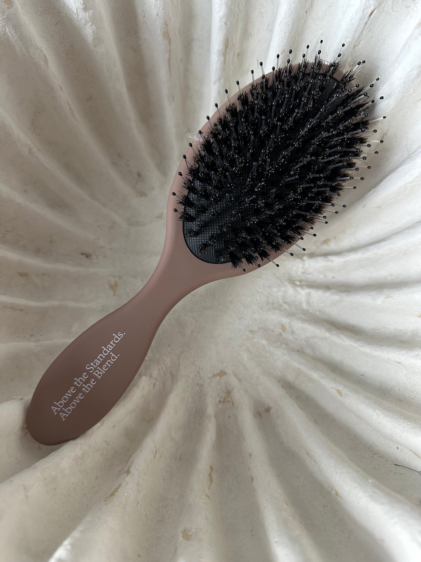 ABOVE HAIR BRUSH