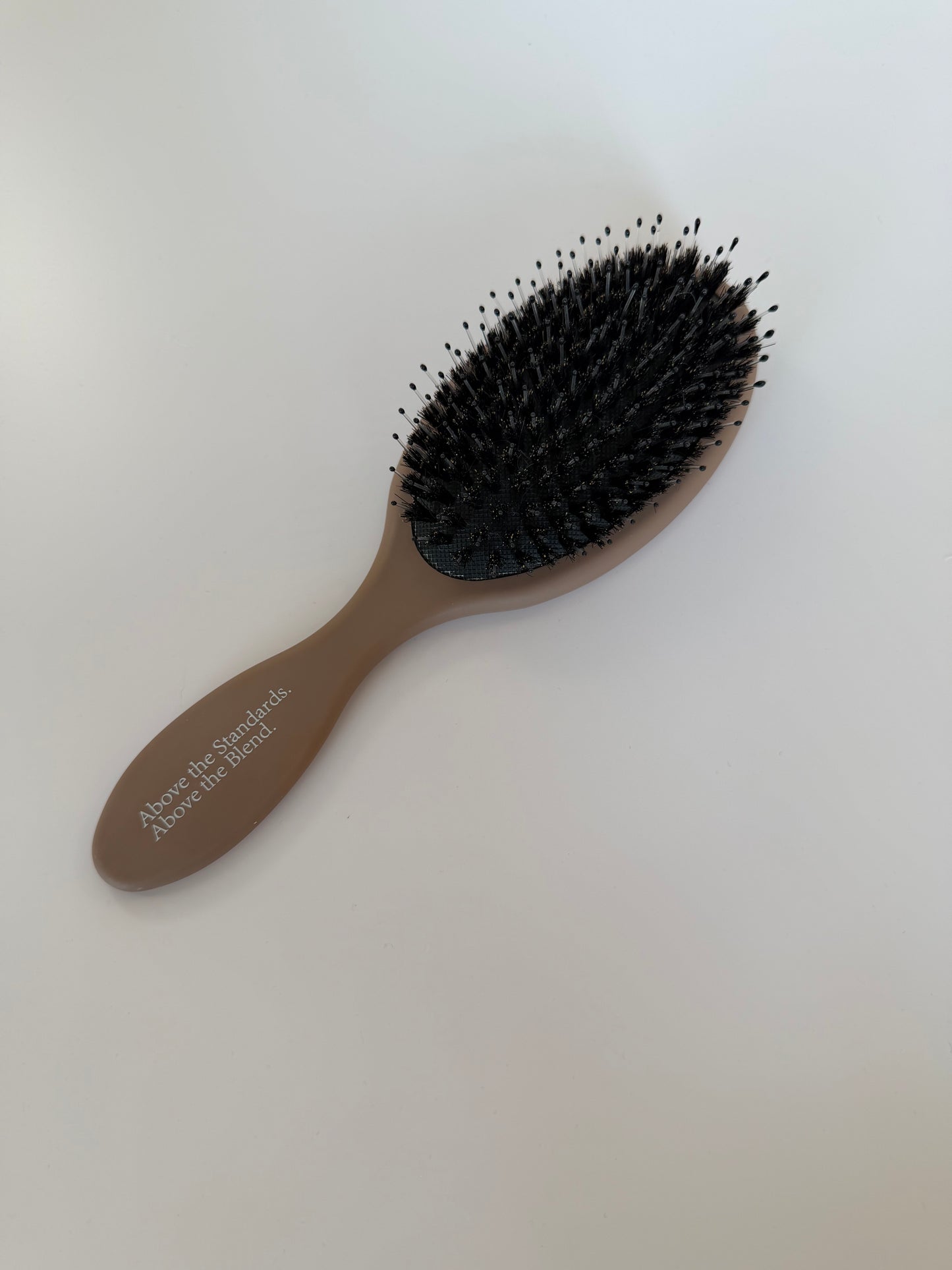ABOVE HAIR BRUSH