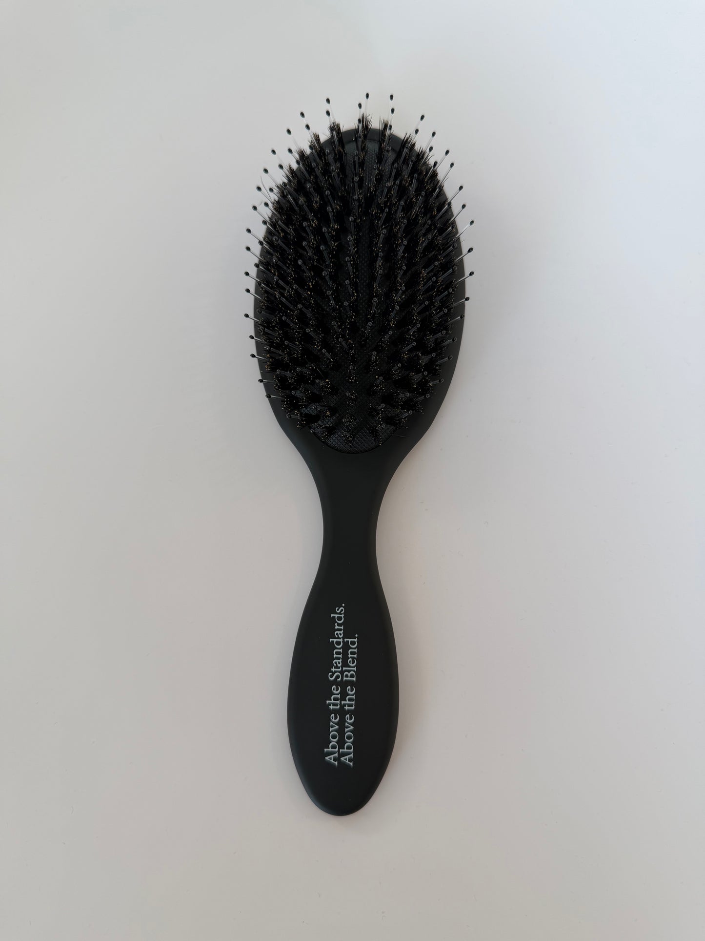 ABOVE HAIR BRUSH