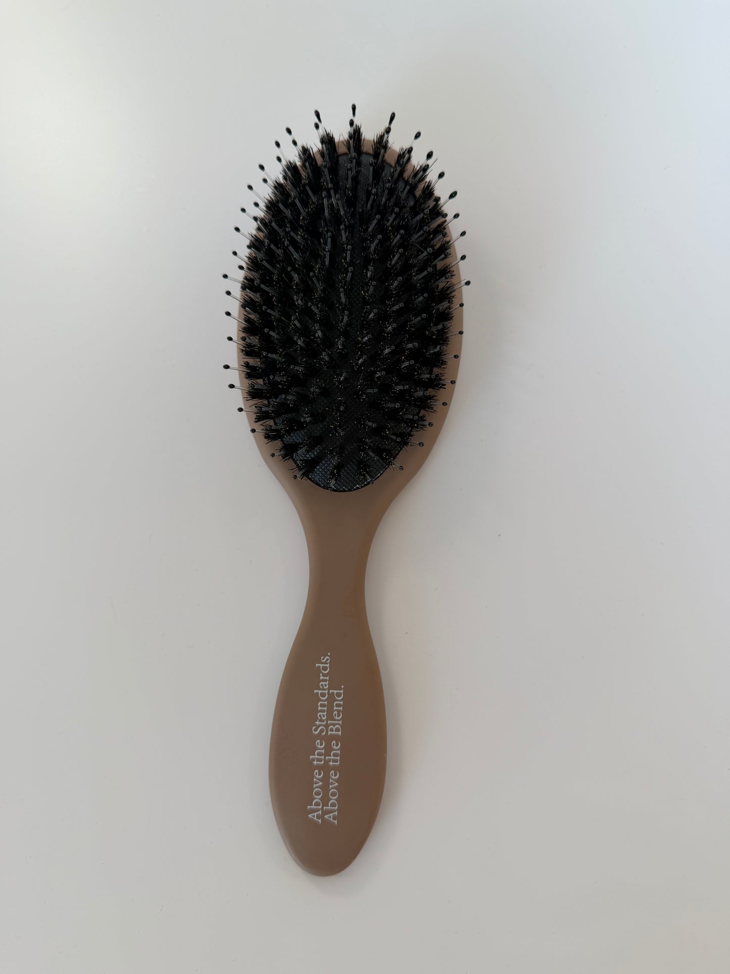 ABOVE HAIR BRUSH