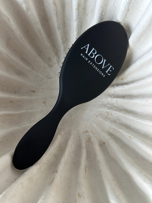 ABOVE HAIR BRUSH